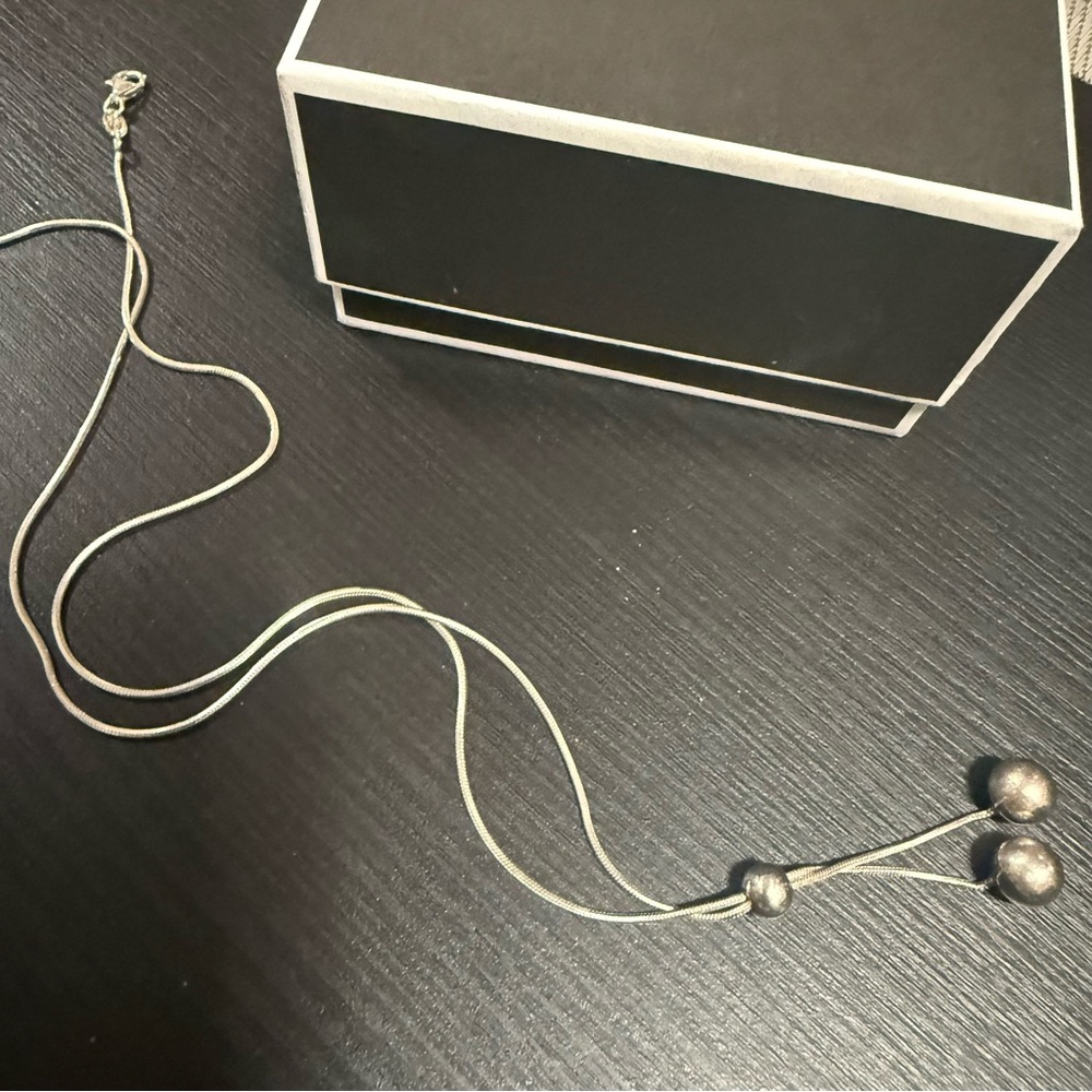 Elegant Silver Necklace with Bead Accents